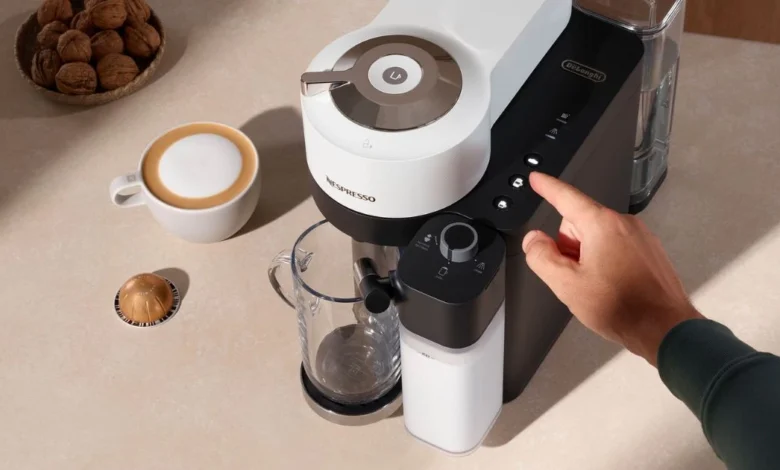 Person demonstrating how to use Nespresso machine Vertuo Lattissima.